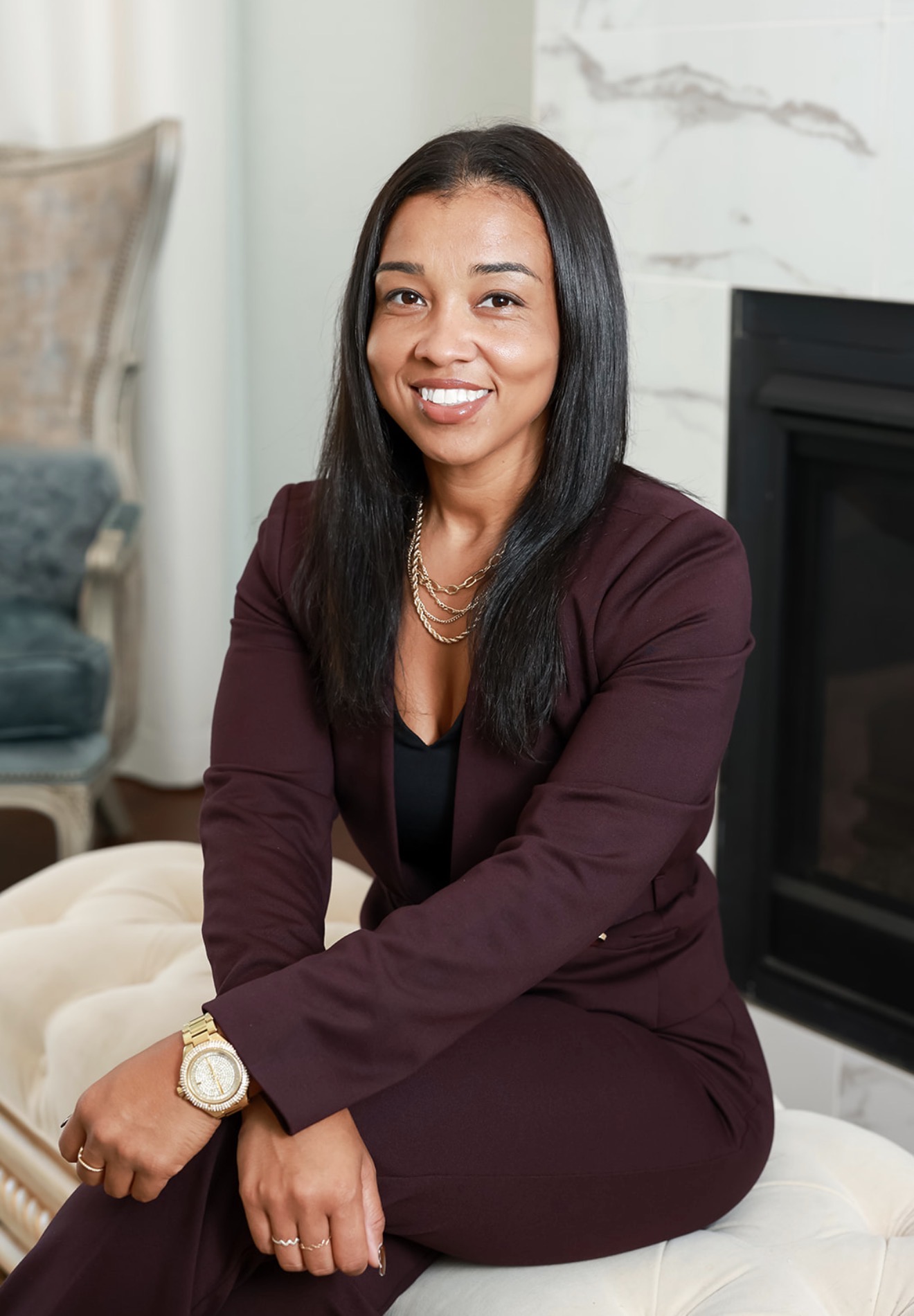 Bianca Edge, REALTOR, wearing a burgundy suit